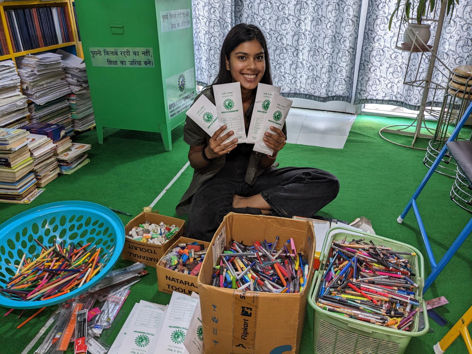 Community members contributing used books to a neighborhood book bank