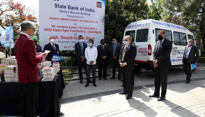 SBI Chairman Mr. Dinesh Kumar Khera commended Open Eyes Foundation, gifting a tempo traveller and books worth Rs. 50,000 at Chandigarh under CSR ( March 2021).